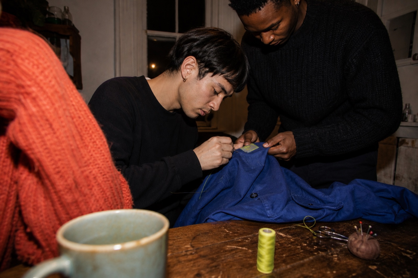 Friends caring for a garment